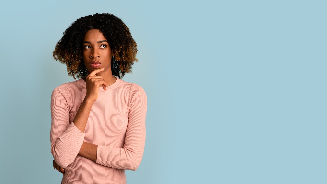 bigstock-Portrait-Of-Pensive-Black-Woma-434925659